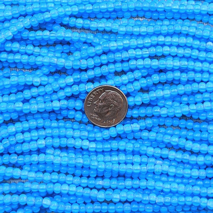 6/0 Aqua Cornelian Star Czech Glass Seed Bead Strand (6BW193) - Beads and Babble