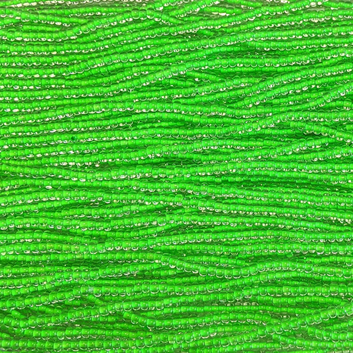 6/0 Transparent Crystal Green Lined Glow in the Dark UV Black Light Reactive Czech Glass Seed Bead Strand (6BW159) - Beads and Babble